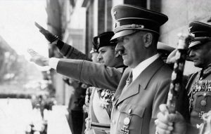 Adolf Hitler and Joachim von Ribbentrop, Mussolini's son-in-law, attend a Nazi Party rally