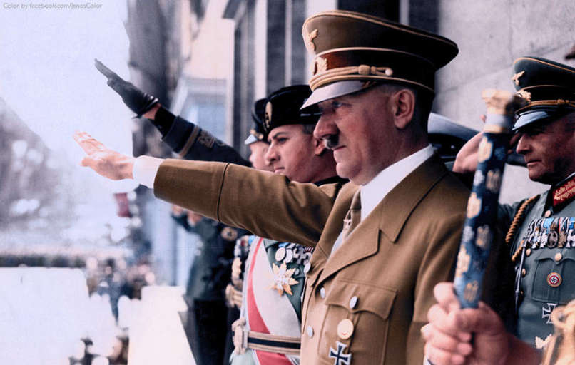Adolf Hitler and Joachim von Ribbentrop, Mussolini's son-in-law, attend a Nazi Party rally Color