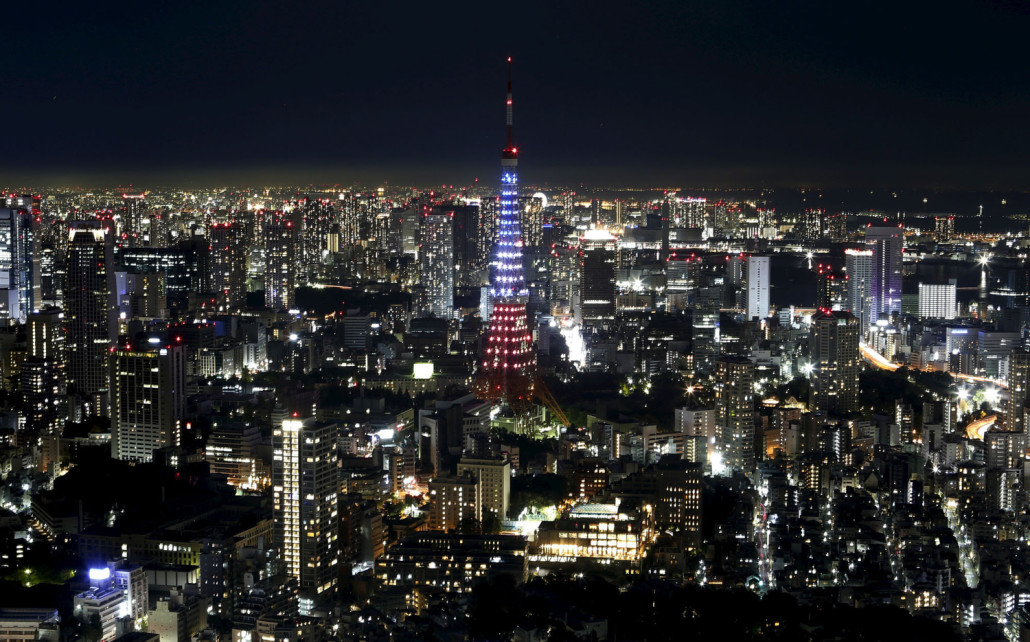 Tokyo Tower is illuminated in blue, white and red, the colors of the French flag in response to the Paris attacks, in Tokyo