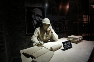 A model and a photograph of John Rabe, sometimes call "China's Schindler", are seen in a museum, during a reporting trip in Nanjing